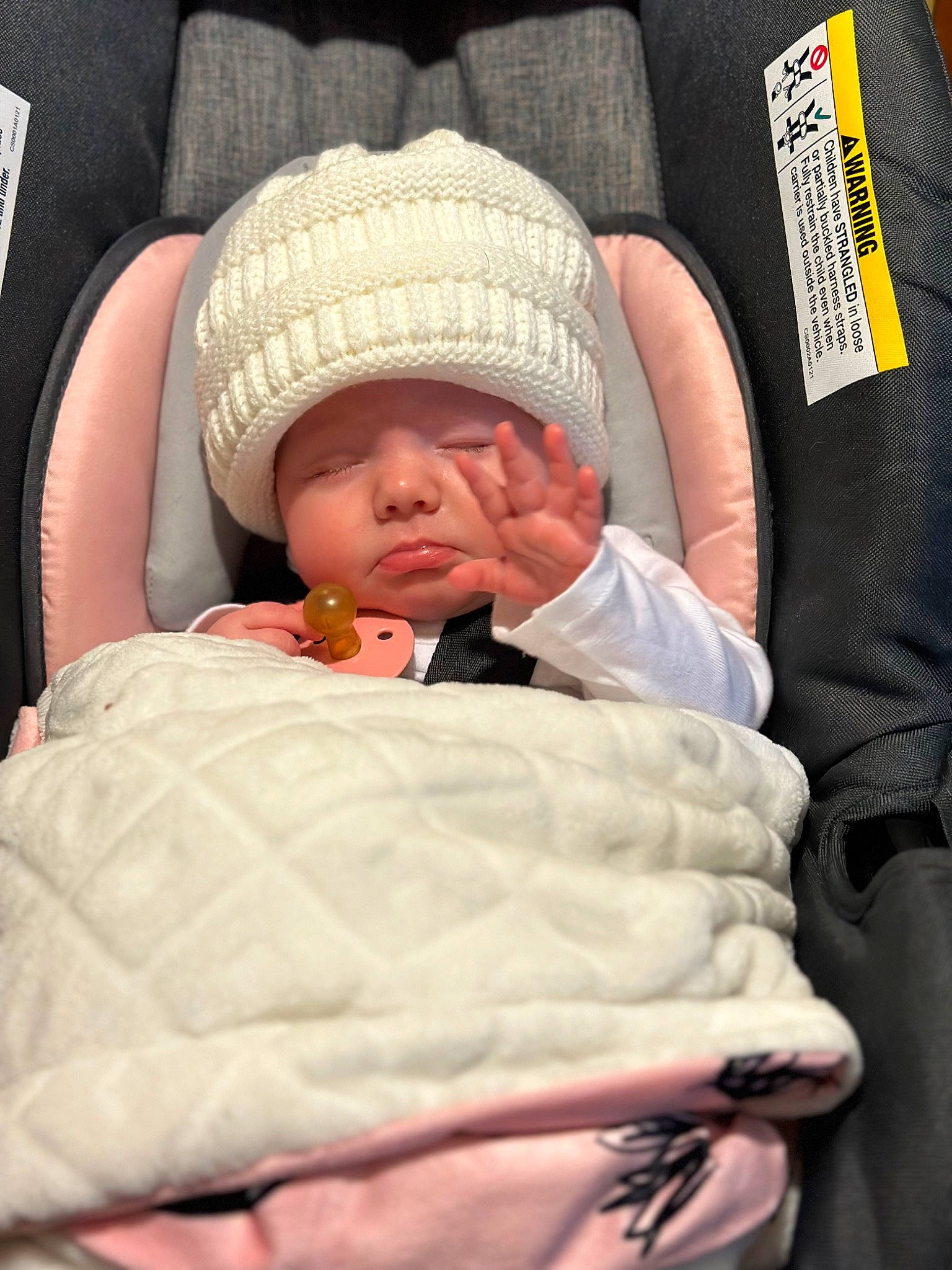 Winter joined the competition — help win amazing prizes! baby, baby_products, baby_safety, baby_sleeping, baby_toddler_clothing, beanie, cap, cheek, child, chin, comfort, headwear, knit_cap, linens, person, room, sitting, skin, sleeve, textile