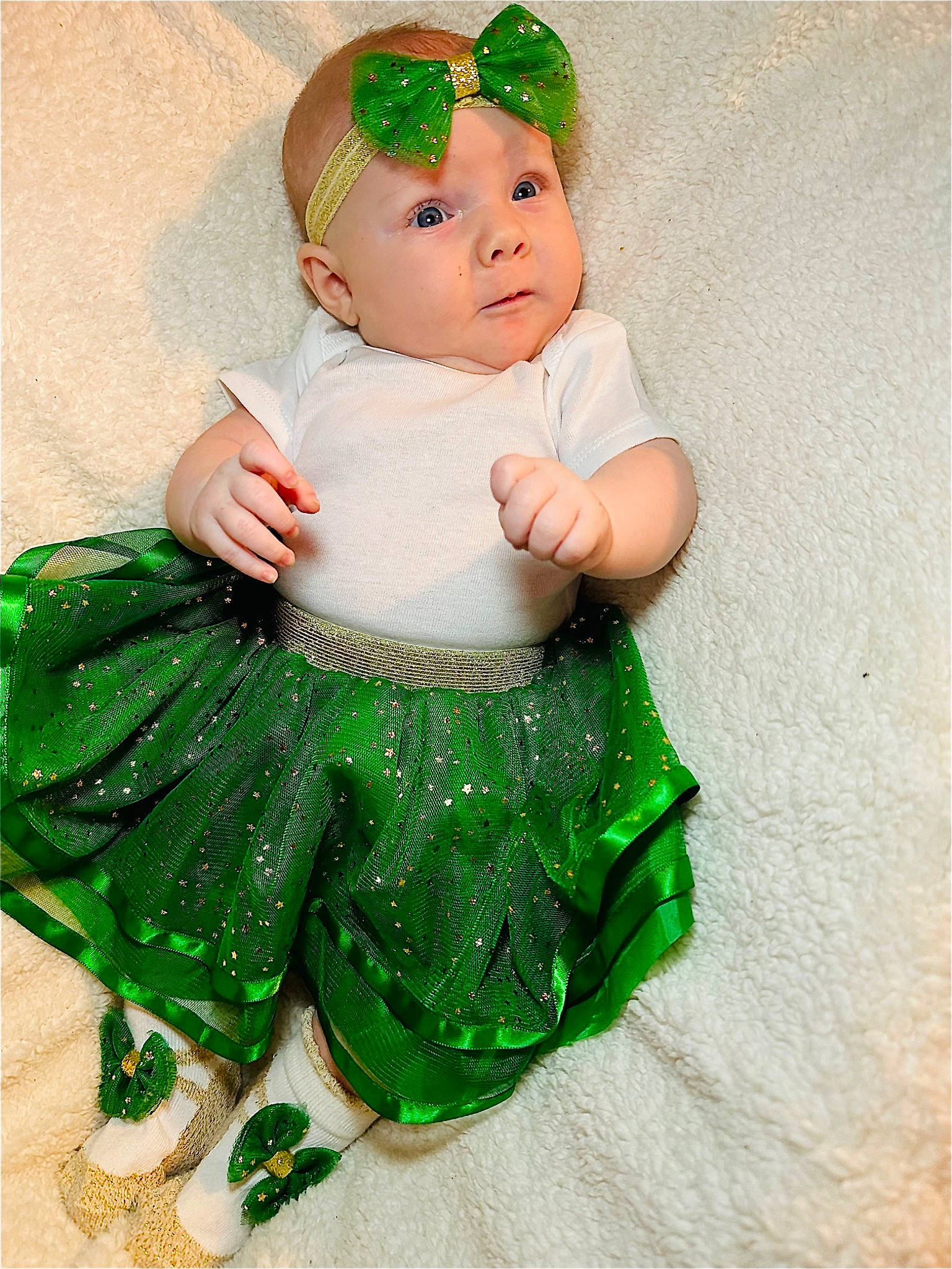 Winter is registered to the contest to win money with this photo: abdomen, baby, baby_products, baby_toddler_clothing, cap, chest, child, costume_hat, doll, fictional_character, grass, headwear, pattern, person, sleeve, thigh, thumb, toddler, toy, trunk