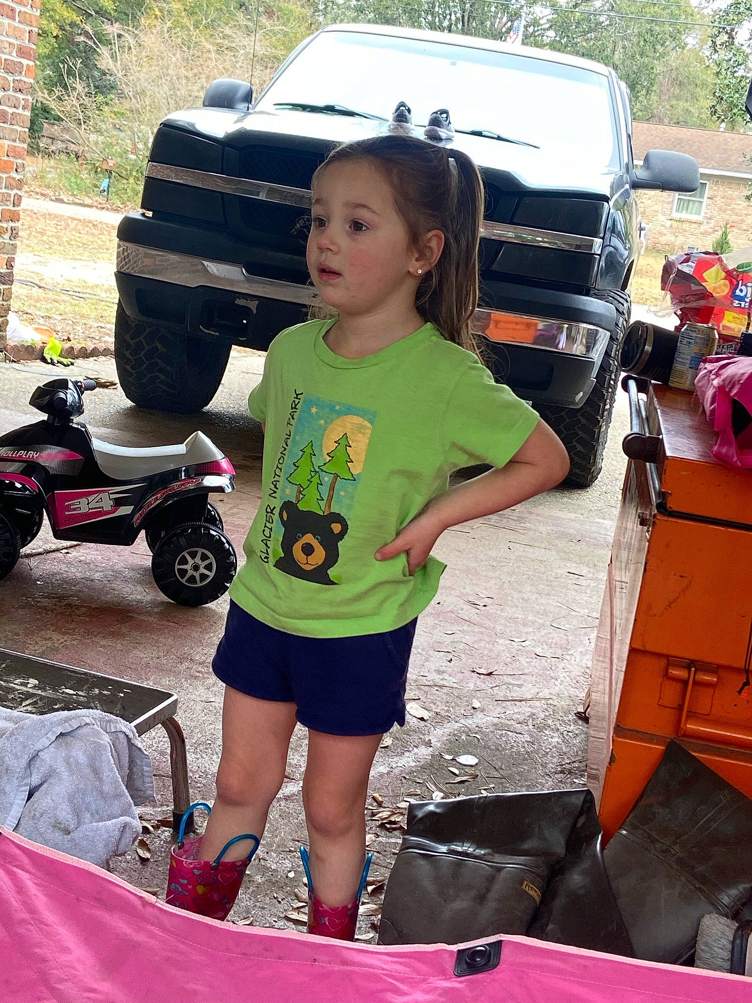 Aubreigh joined the competition — help win amazing prizes! asphalt, automotive_design, automotive_exterior, automotive_lighting, automotive_tire, bumper, car, fender, fun, hood, land_vehicle, leisure, mode_of_transport, motor_vehicle, person, shorts, tire, travel, truck, vehicle