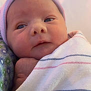 Halo joined the competition — help win amazing prizes! newborn, baby, infant, face, hat, striped_blanket, wrapped, cute, human, skin, eyes, indoors, portrait, headwear, newborn_hat, baby_clothing, lying_down, soft, hospital, resting