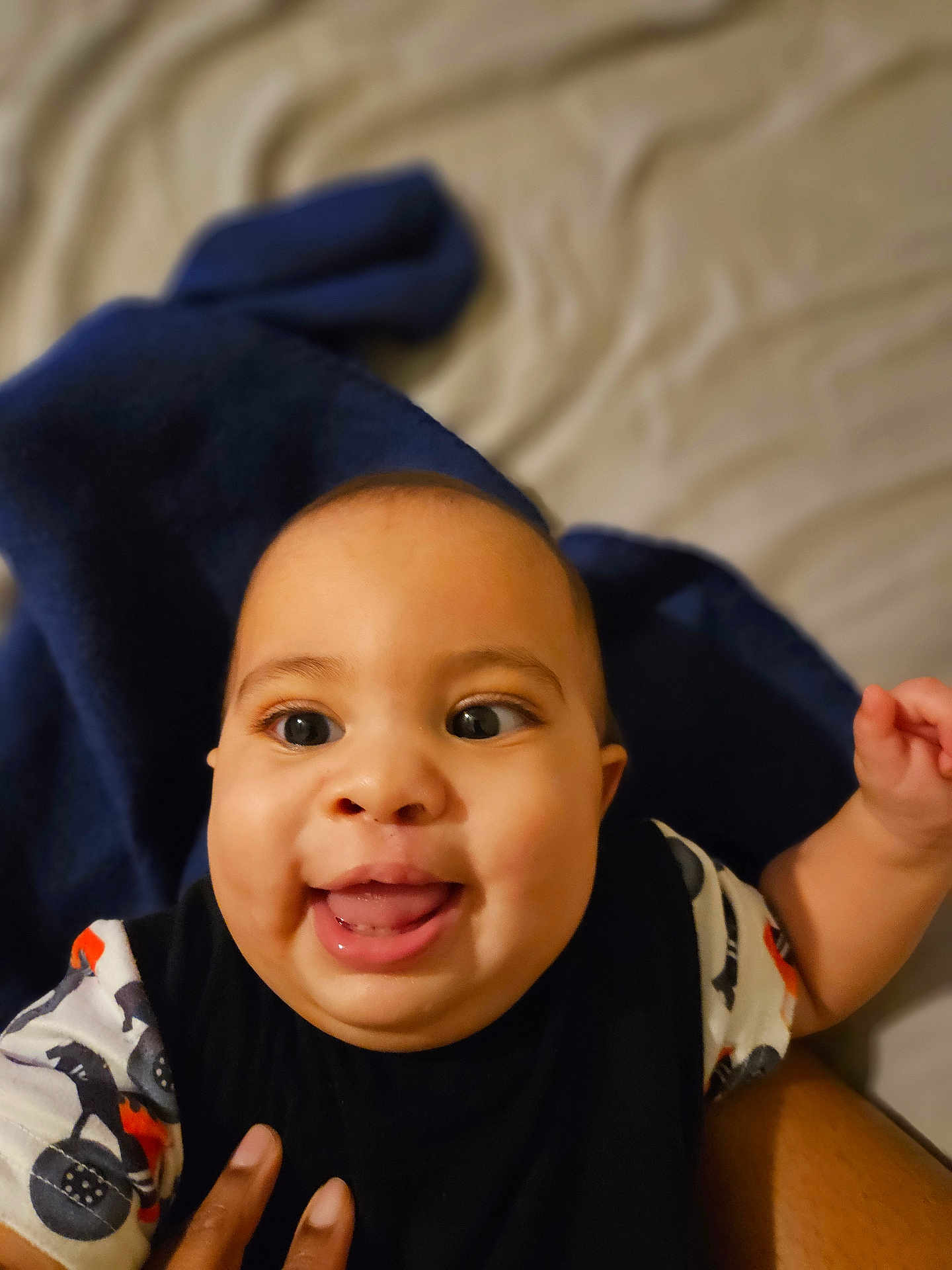 Brysan joined the competition — help win amazing prizes! baby, smile, tongue, face, child, infant, happy, cozy, blanket, blue, person, cute, expression, skin, clothing, indoor, portrait, young, hand, playful