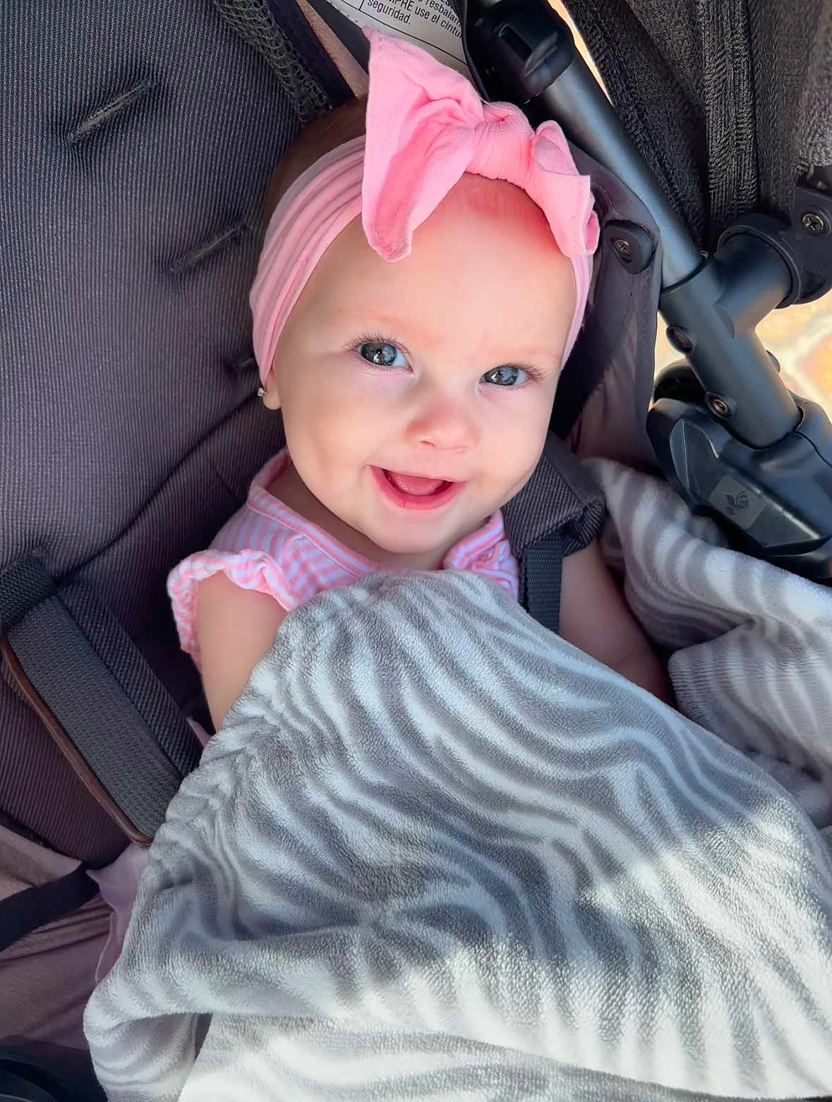 Aries is registered to the contest to win money with this photo: accessories, baby, baseballcap, bonnet, cap, clothing, cushion, face, gun, happy, hat, head, homedecor, person, photography, portrait, smile, transportation, vehicle, weapon