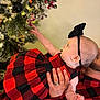 accessories, baby, blanket, bodypart, christmas, christmasdecorations, christmastree, conifer, face, festival, finger, hand, head, lighting, person, photography, plant, portrait, tartan, tree