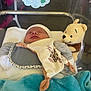 Gabriel a rejoint le concours — aidez-le/la à gagner de superbes lots ! newborn, baby, hospital, bassinet, blanket, plush_toy, winnie_the_pooh, sleeping, infant, clothing, hat, nursery, healthcare, cute, resting, soft_toy, comfort, child, bed, wrapped