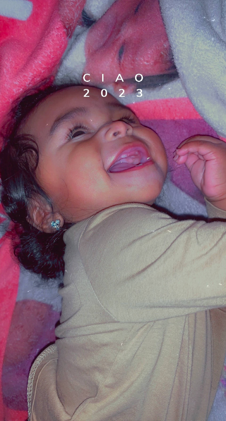 Ariana is registered to the contest to win money with this photo: chest, cool, eye, eyebrow, finger, gesture, happy, headgear, iris, lip, magenta, mouth, nose, person, pink, skin, smile, thigh, thumb, toddler