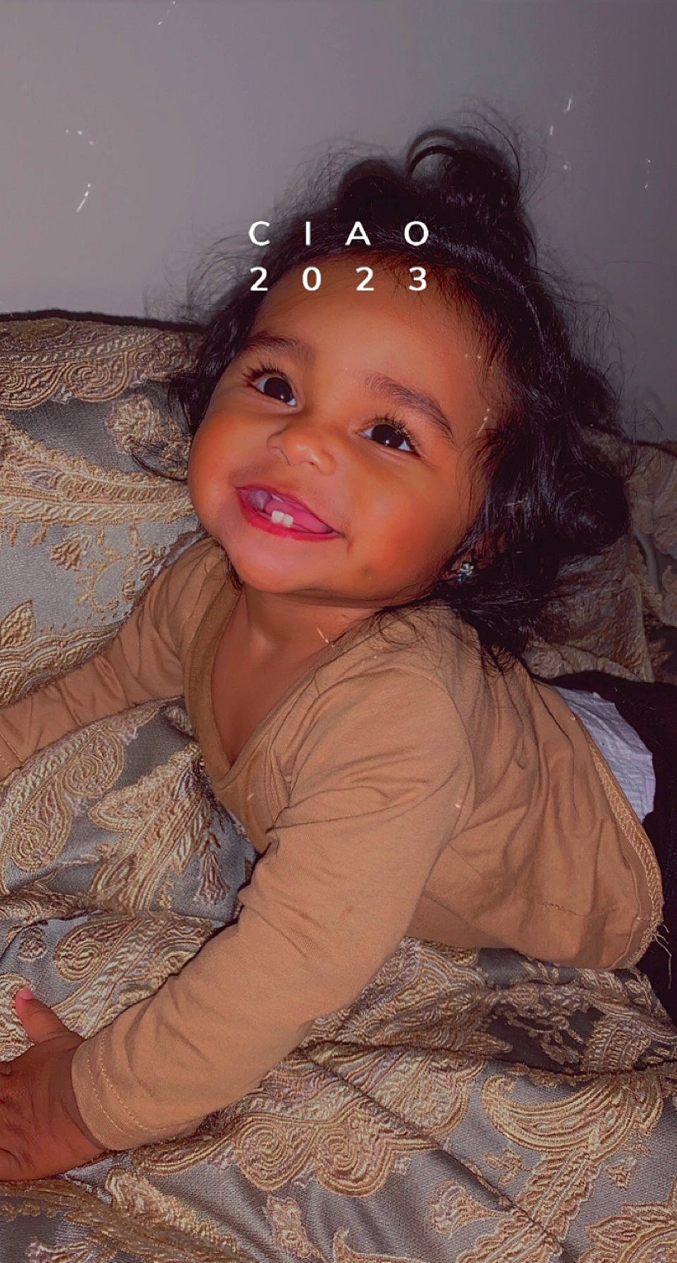 Ariana is registered to the contest to win money with this photo: baby_toddler_clothing, brown_hair, cheek, child, chin, dress, embellishment, eyebrow, eyelash, flash_photography, fun, happy, headpiece, iris, joy, lip, nose, person, pink, skin