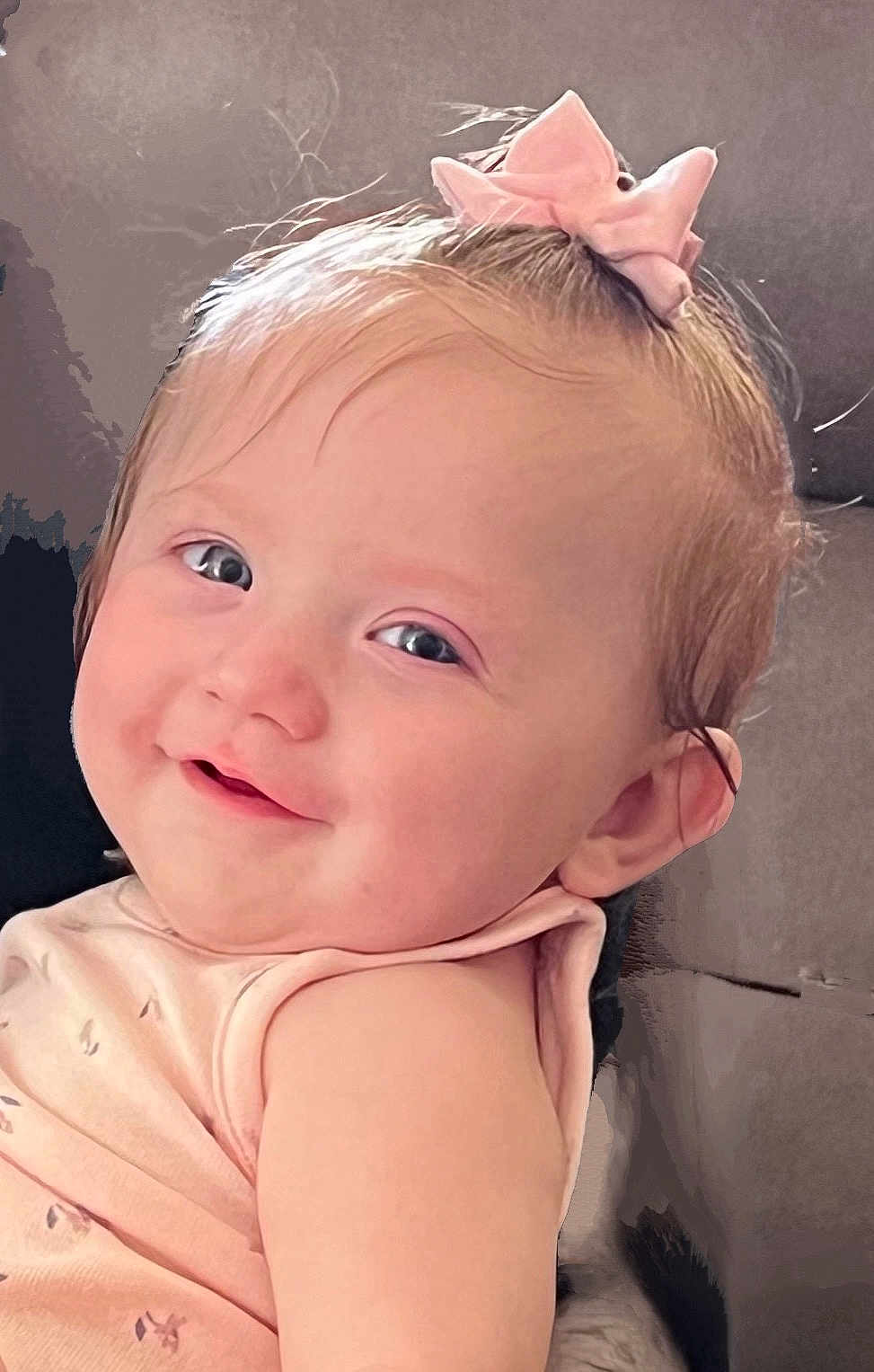 Harley joined the competition — help win amazing prizes! baby, child, smile, face, pink_bow, hair_accessory, infant, cute, portrait, closeup, skin, young_child, cheeks, happy, eyes, head, clothing, soft_lighting, indoors, cozy