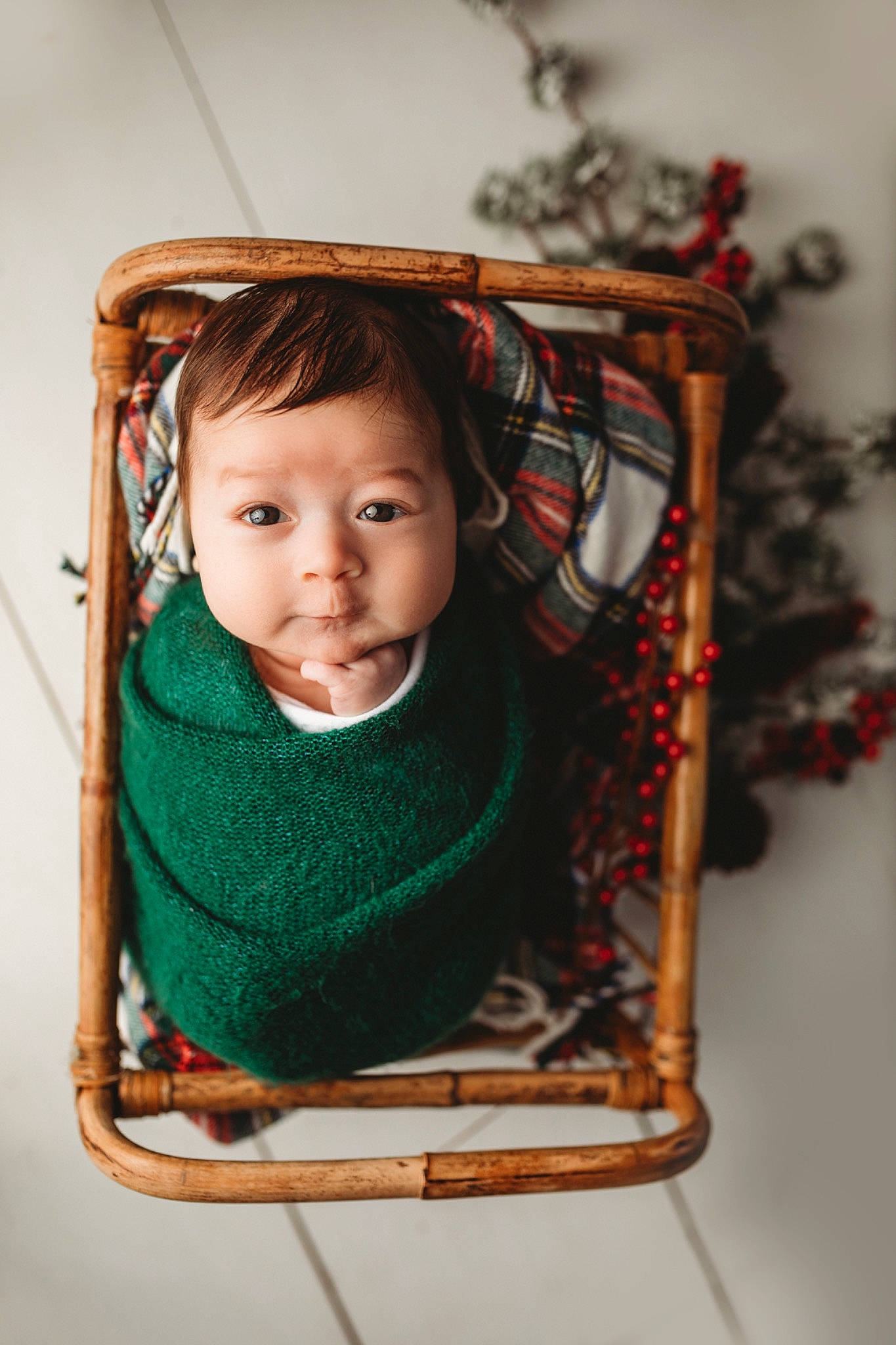 Jett is registered to the contest to win money with this photo: baby, baby_toddler_clothing, child_model, christmas, christmas_decoration, costume_accessory, craft, outdoor_play_equipment, person, playground, sweater, textile, thread, winter, wool, woolen