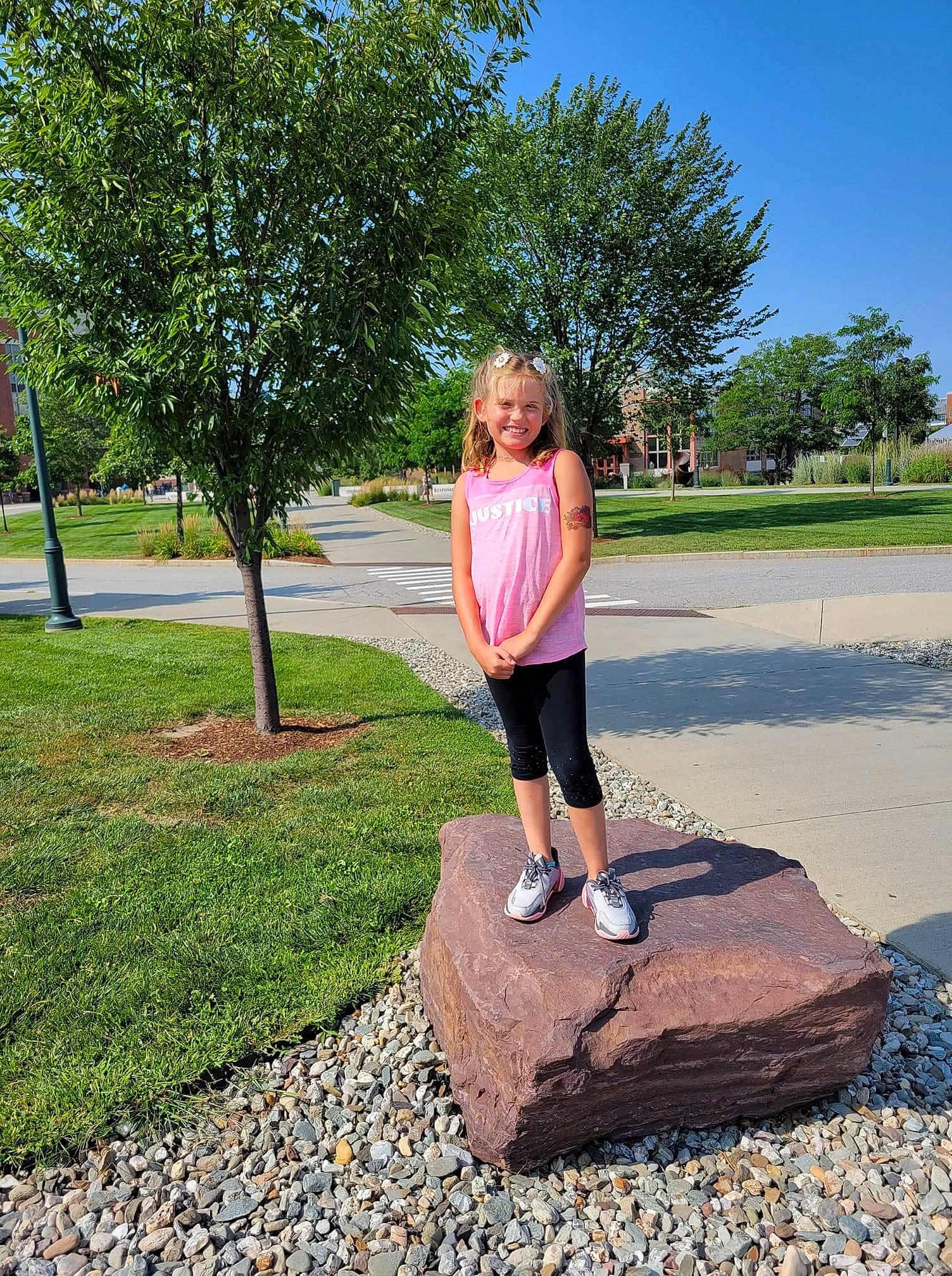 Aleah joined the competition — help win amazing prizes! asphalt, balance, electric_blue, grass, human_leg, joy, knee, landscape, leisure, people_in_nature, person, pink, plant, recreation, road_surface, shorts, sky, t_shirt, thigh, tree