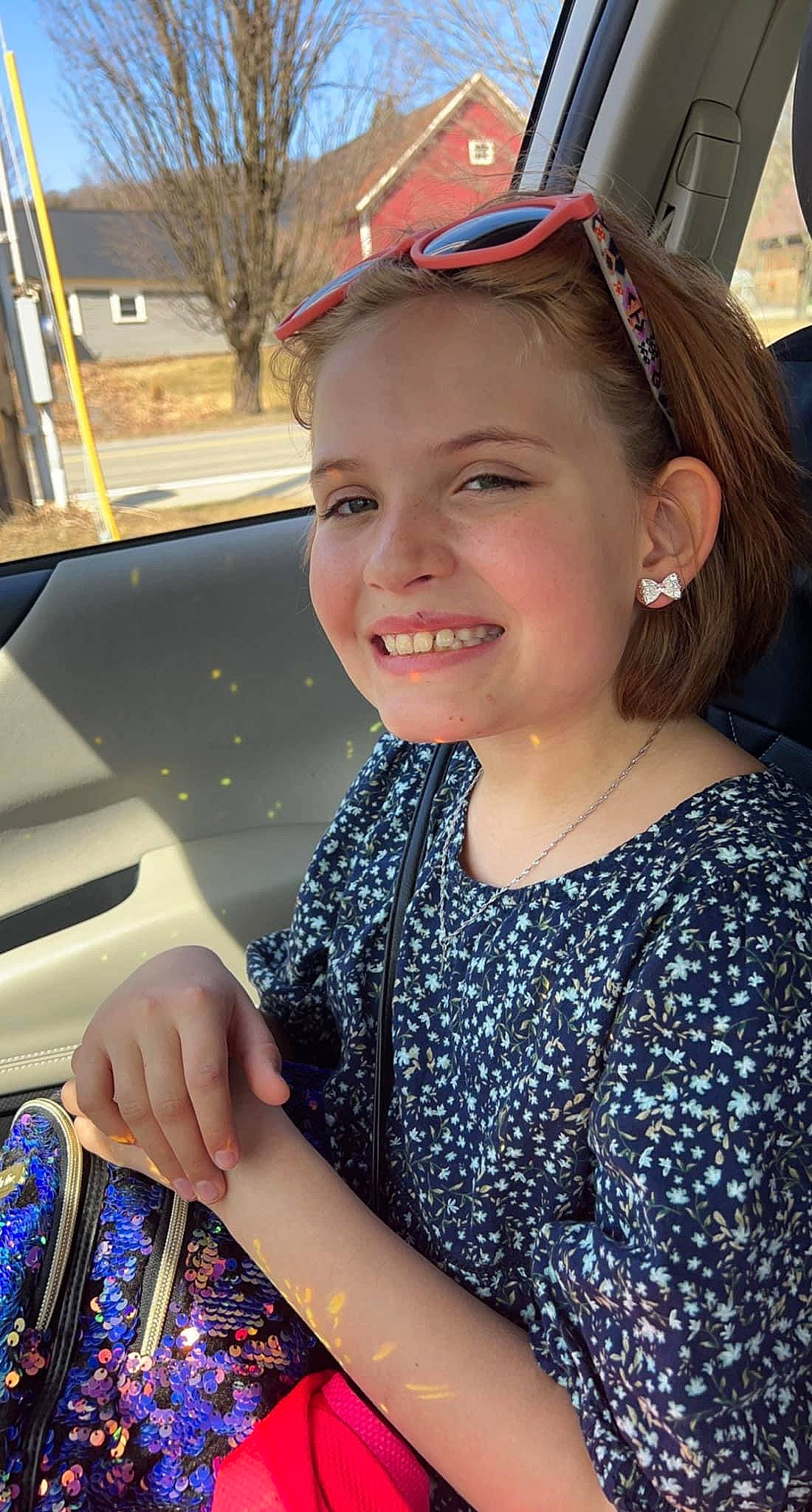 Aleah is registered to the contest to win money with this photo: automotive_design, automotive_exterior, automotive_lighting, car, cool, electric_blue, eyewear, fun, happy, head, jewellery, joy, leisure, motor_vehicle, person, personal_luxury_car, recreation, smile, snapshot, travel