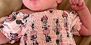 Poetri joined the competition — help win amazing prizes! baby, blanket, child, cute, expression, face, head, indoor, infant, laying_down, minnie_mouse, patterned_outfit, person, pink_clothing, portrait, raised_fist, sleepwear, small_hand, soft_texture, young_child