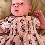 Poetri joined the competition — help win amazing prizes! baby, infant, child, pink_clothing, minnie_mouse, patterned_outfit, blanket, laying_down, cute, young_child, person, face, head, expression, raised_fist, small_hand, soft_texture, indoor, portrait, sleepwear