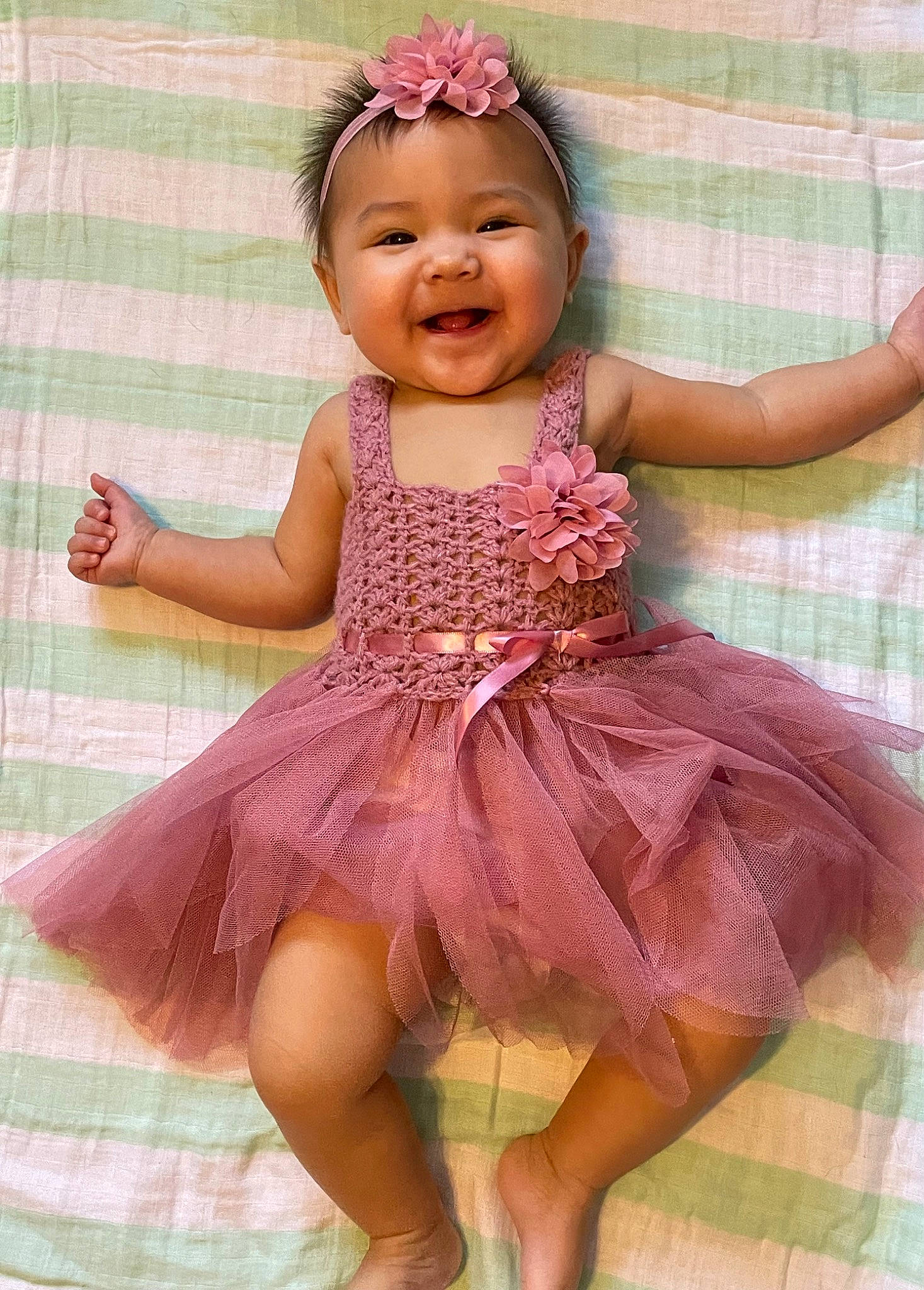 Aubriella joined the competition — help win amazing prizes! baby, baby_toddler_clothing, child, day_dress, dress, embellishment, event, fashion_accessory, finger, happy, joy, magenta, one_piece_garment, pattern, person, pink, purple, skin, sleeve, smile