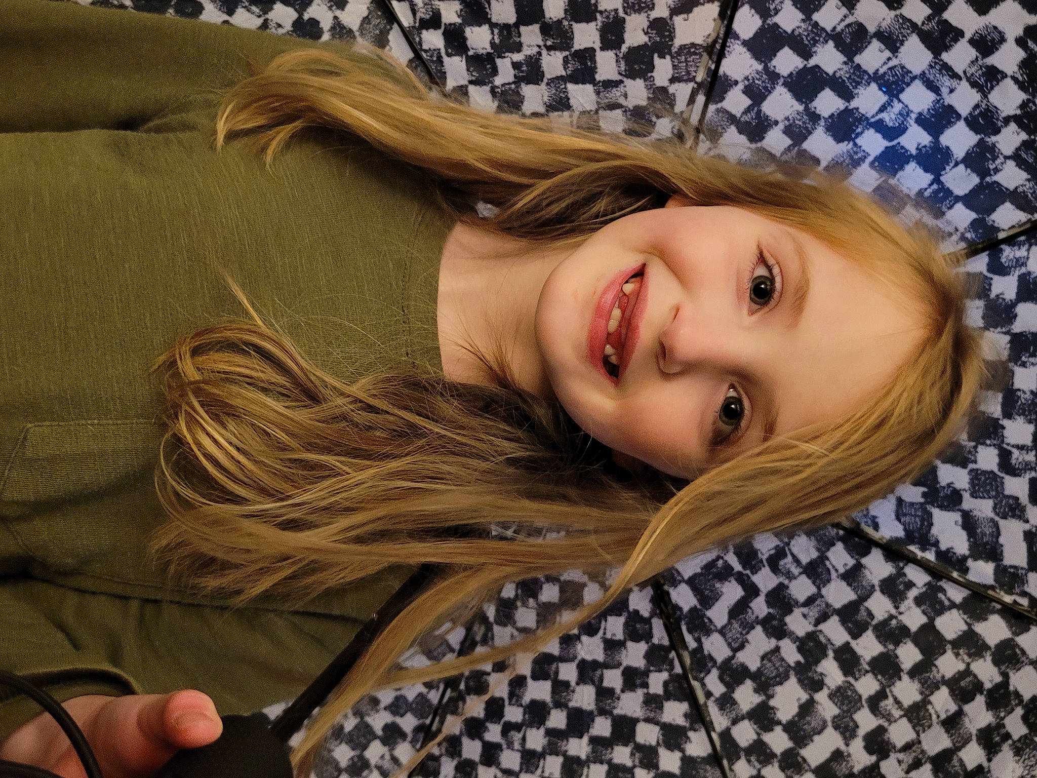 Adrienne is registered to the contest to win money with this photo: blond, brown_hair, cheek, comfort, couch, eye, eyebrow, eyelash, face, flash_photography, grass, happy, head, iris, joy, layered_hair, lip, long_hair, nose, person