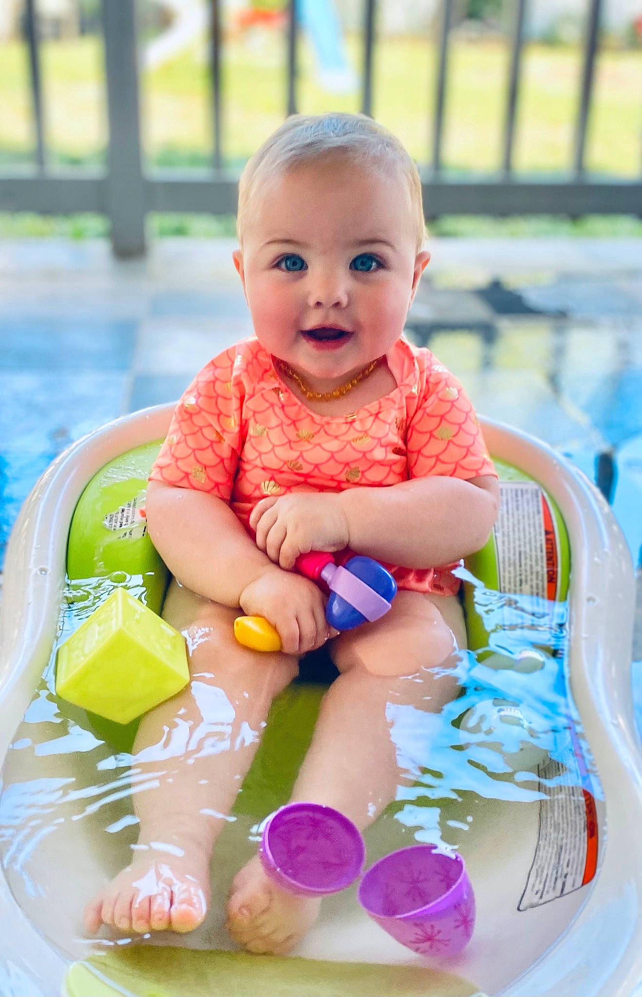 Ella is registered to the contest to win money with this photo: baby, baby_playing_with_toys, baby_products, baby_toddler_clothing, cheek, child, fun, grass, happy, leisure, person, playing_with_kids, product, recreation, sitting, skin, smile, snapshot, toddler, toy