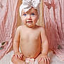 adorable, baby, blue_eyes, bow, butterfly, child, cute, decor, fluffy_rug, headband, indoors, infant, naked, pink_curtains, portrait, sitting, skin, smiling, soft_lighting, toddler