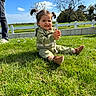 Charlie a rejoint le concours — aidez-le/la à gagner de superbes lots ! casual, child, clapping, cloud, daylight, fence, grass, greenery, happy, nature, outdoor, pants, person, pigtails, shoes, sky, smiling, sunlight, toddler, tree