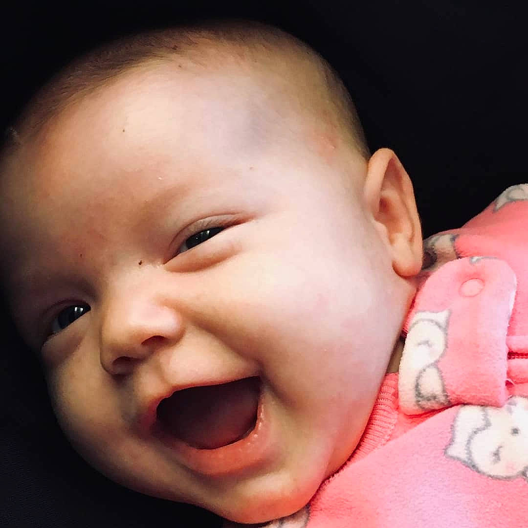 Grace is registered to the contest to win money with this photo: baby, baby_making_funny_faces, cheek, child, chin, close_up, ear, eye, face, facial_expression, forehead, head, human, lip, mouth, nose, organ, person, skin, smile