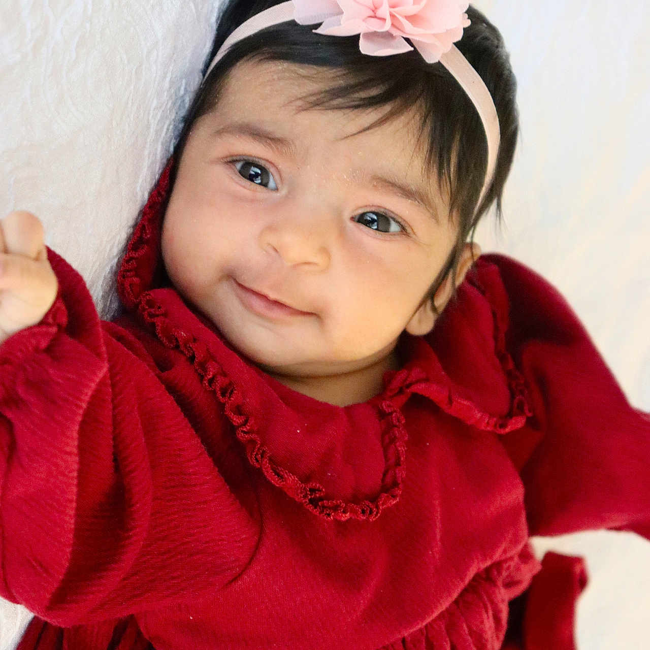 Ibbani is registered to the contest to win money with this photo: accessories, baby, bodypart, clothing, dress, face, finger, hand, happy, hat, head, headband, hoodie, knitwear, person, photography, portrait, smile, sweater, sweatshirt