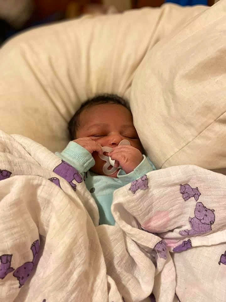 Araya is registered to the contest to win money with this photo: baby, baby_products, baby_safety, baby_sleeping, baby_toddler_clothing, bedding, bedtime, cheek, child, comfort, event, eyebrow, face, head, infant_bed, linens, nap, nose, person, textile