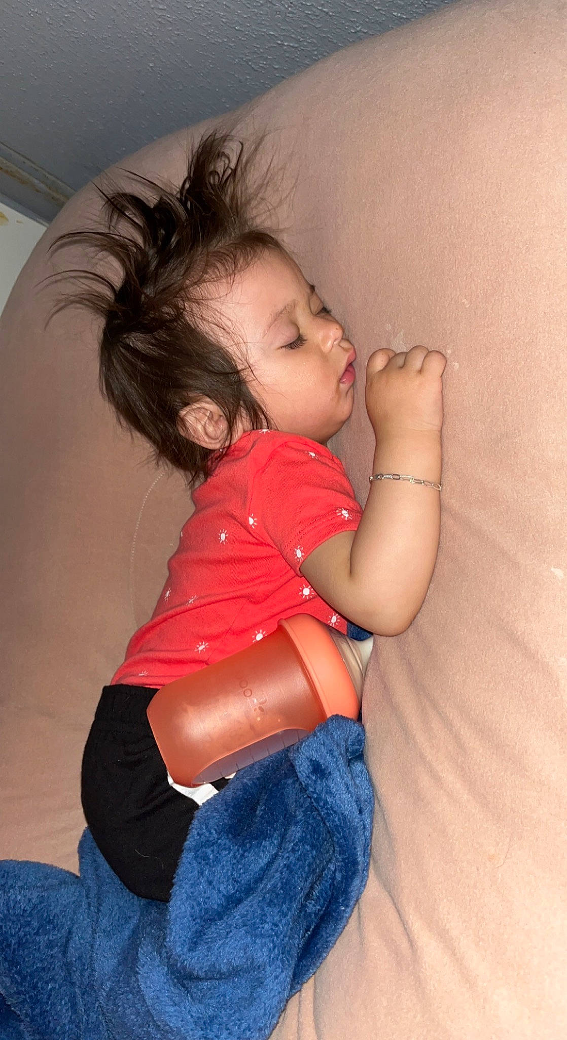 Ezlyn is registered to the contest to win money with this photo: arm, baby_toddler_clothing, cheek, comfort, eye, eyelash, flash_photography, hair, hand, head, human, human_body, jeans, joint, lip, mouth, neck, nose, person, shoulder