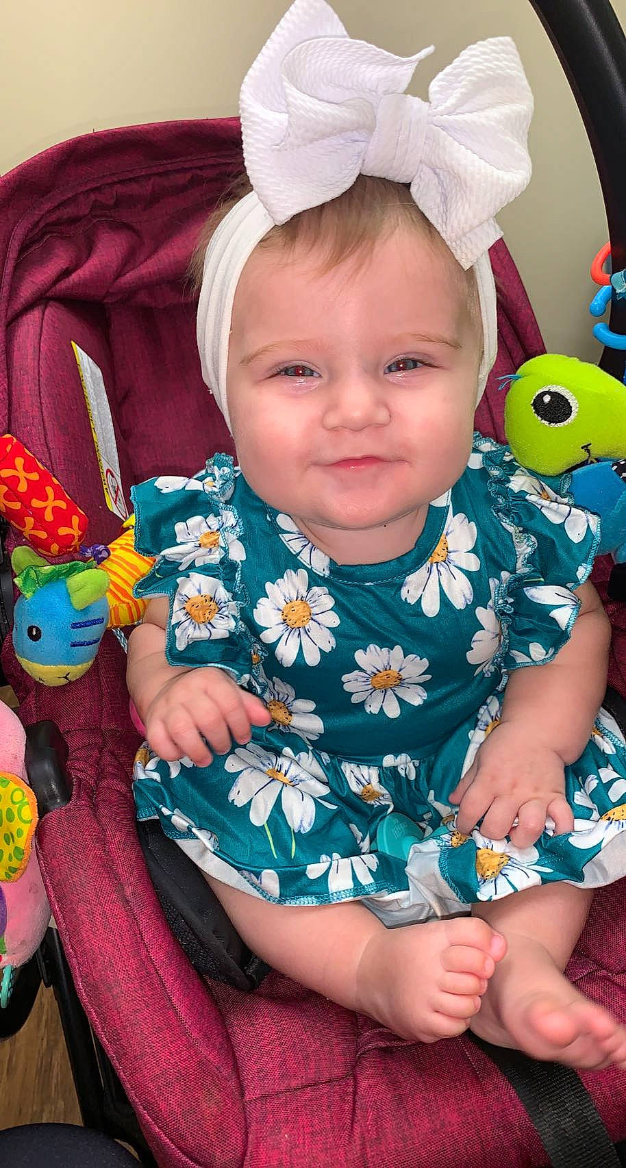 Sadie Mae is registered to the contest to win money with this photo: baby, baby_toddler_clothing, blue, cheek, child, eye, face, green, happy, iris, organ, pattern, person, photograph, pink, skin, sleeve, smile, textile, toddler