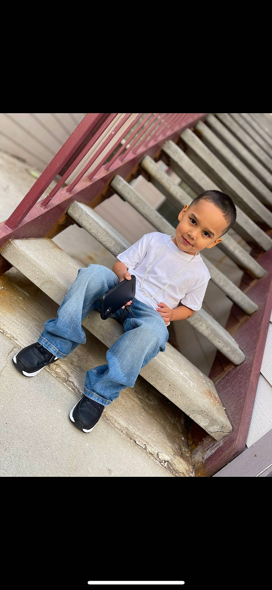 Javian is registered to the contest to win money with this photo: child, denim, flash_photography, flooring, fun, happy, jeans, joy, leisure, pattern, person, portrait_photography, shoe, shorts, sitting, sleeve, sneakers, stock_photography, t_shirt, tints_and_shades