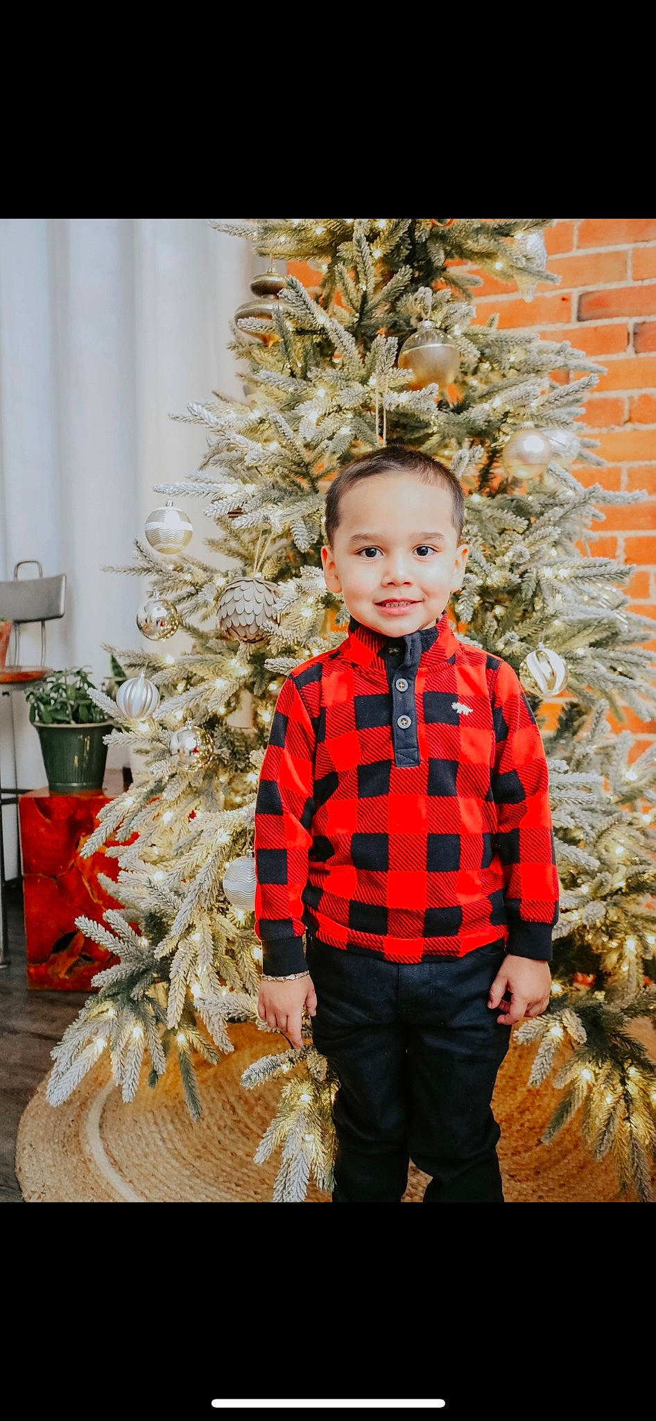 Javian joined the competition — help win amazing prizes! branch, christmas, christmas_decoration, christmas_eve, christmas_ornament, christmas_tree, event, facial_expression, happy, head, holiday, holiday_ornament, joy, ornament, person, plant, shortstraw_pine, smile, standing, toddler