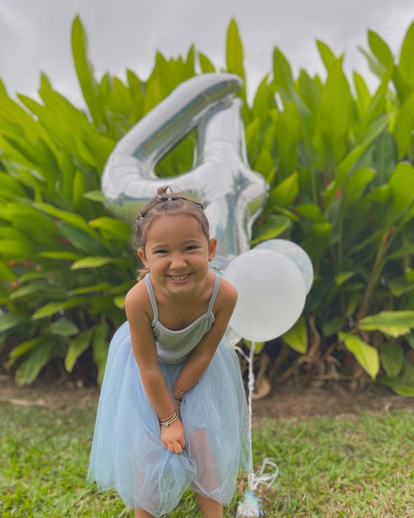 Zailea is registered to the contest to win money with this photo: art, child, costume, fashion_accessory, fun, garden, grass, grass_family, grassland, happy, jewellery, joy, leisure, people_in_nature, person, plant, plantation, sky, smile, summer