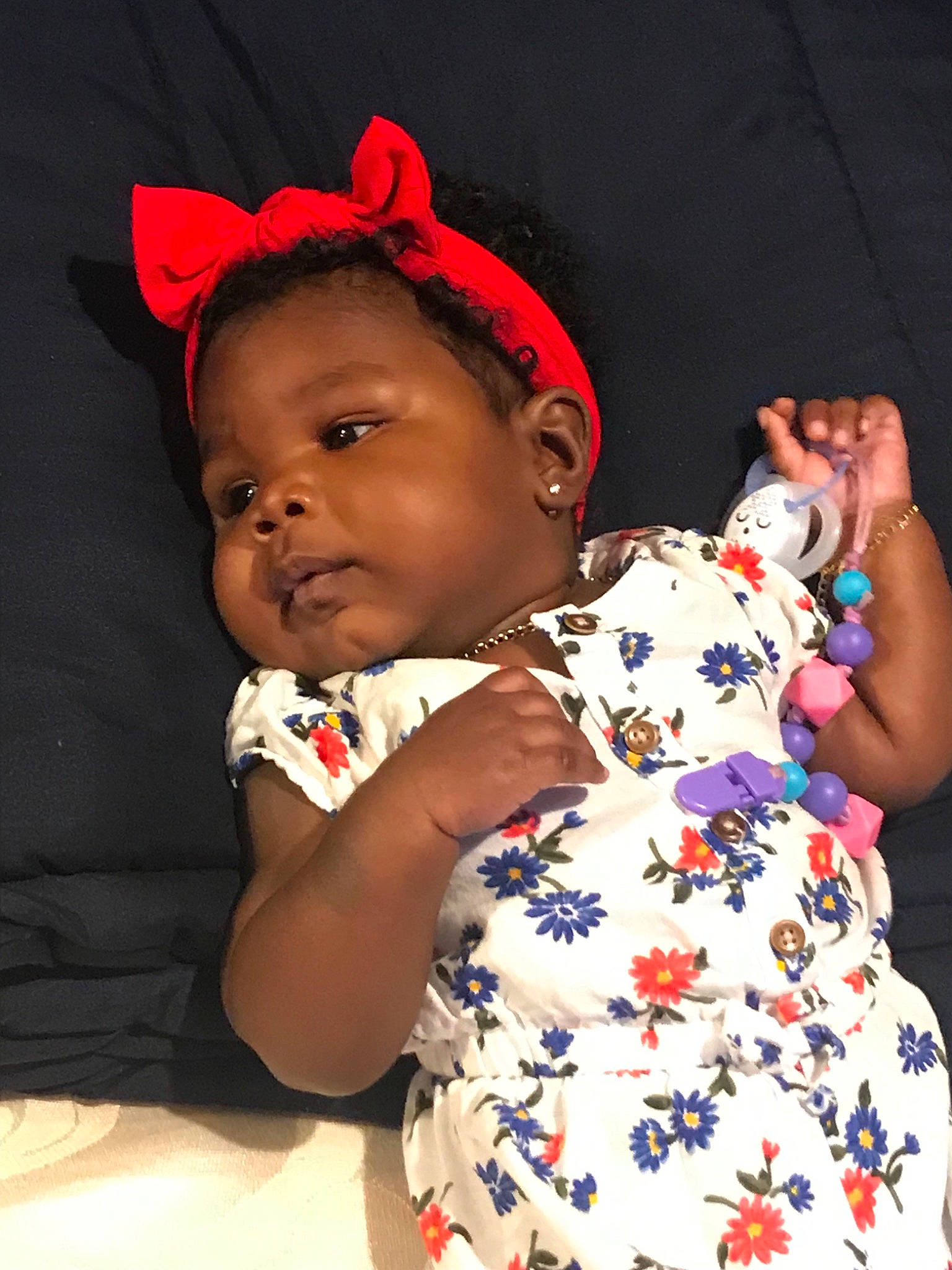 Justyce is registered to the contest to win money with this photo: baby, cheek, child, ear, hair_accessory, headgear, person, toddler