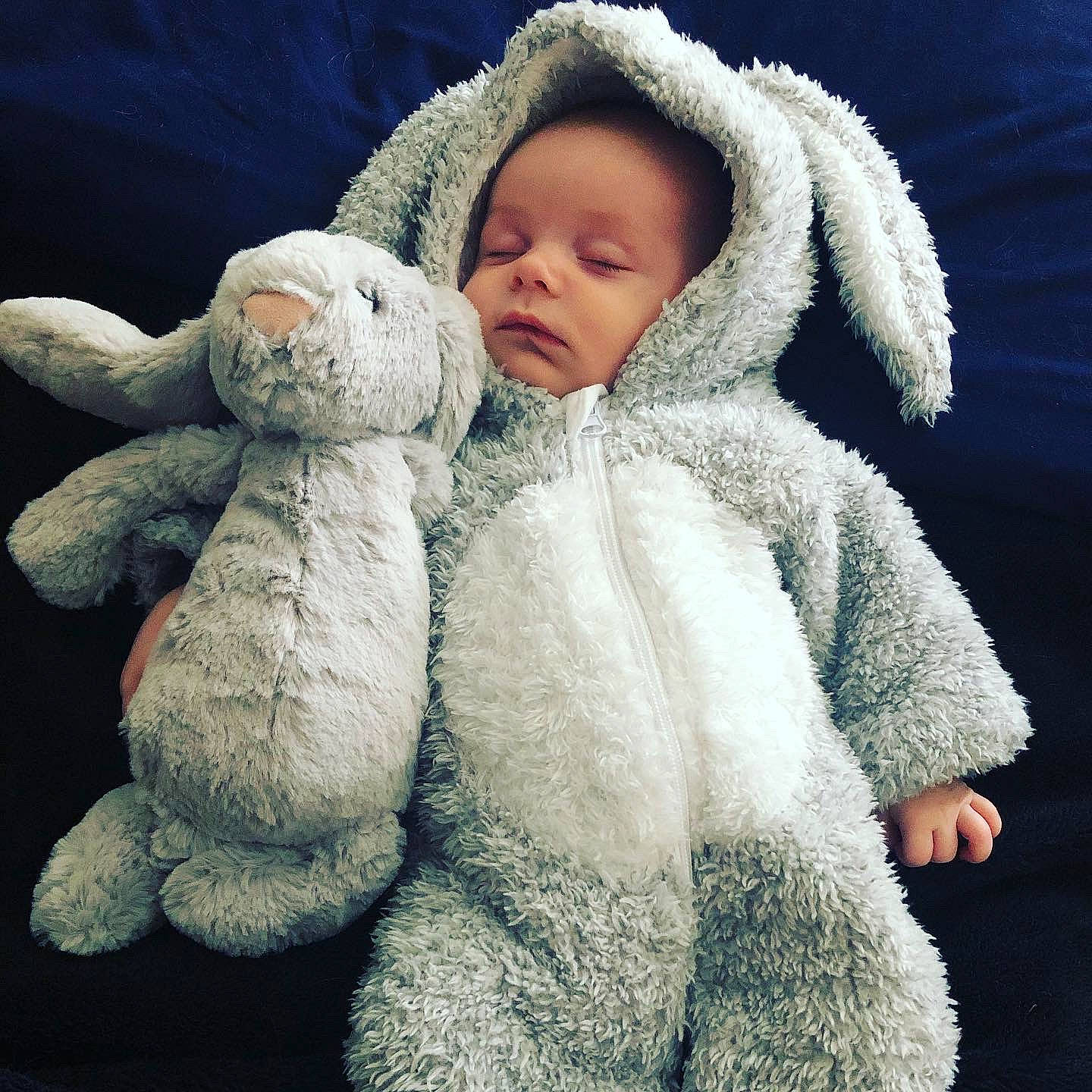 Julien is registered to the contest to win money with this photo: baby, child, ear, fur, fur_clothing, nose, outerwear, person, plush, smile, stuffed_toy, teddy_bear, textile, toddler, toy, wool