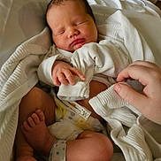 Raphael joined the competition — help win amazing prizes! newborn, baby, sleeping, blanket, hand, diaper, hospital_band, infant, cozy, soft, skin, resting, cute, child, person, wrapped, bed, white, peaceful, tiny
