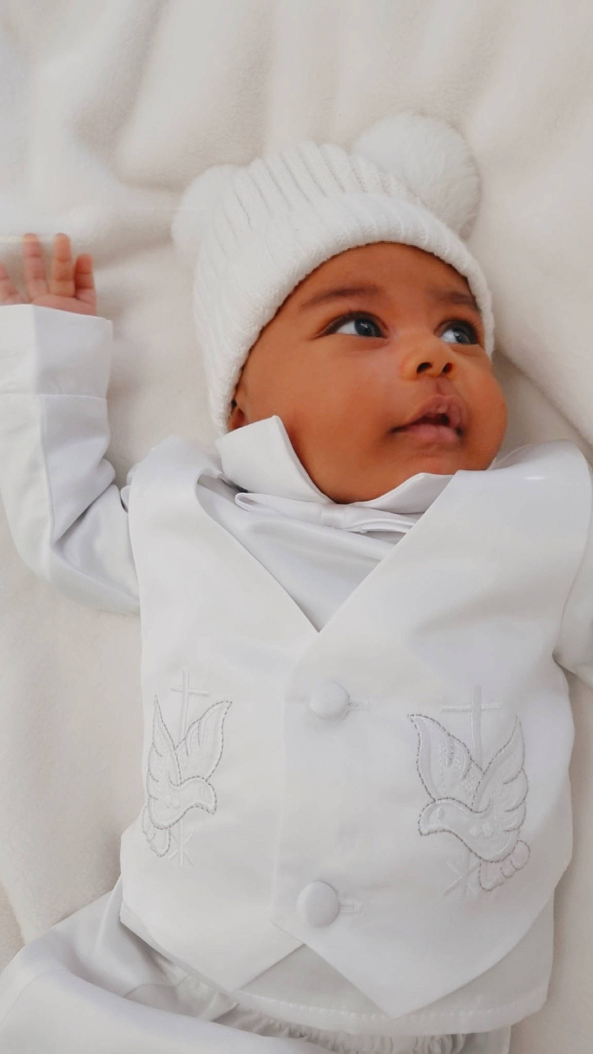 Yodah is registered to the contest to win money with this photo: baby, baby_sleeping, baby_toddler_clothing, beanie, cap, child, collar, comfort, face, gesture, happy, headwear, knit_cap, linens, outerwear, person, portrait_photography, room, sleeve, thumb