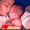 baby, newborn, parent, mother, cuddle, portrait, sleeping, pacifier, family, love, affection, indoors, blanket, bed, closeup, face, infant, parenting, heart, text_overlay