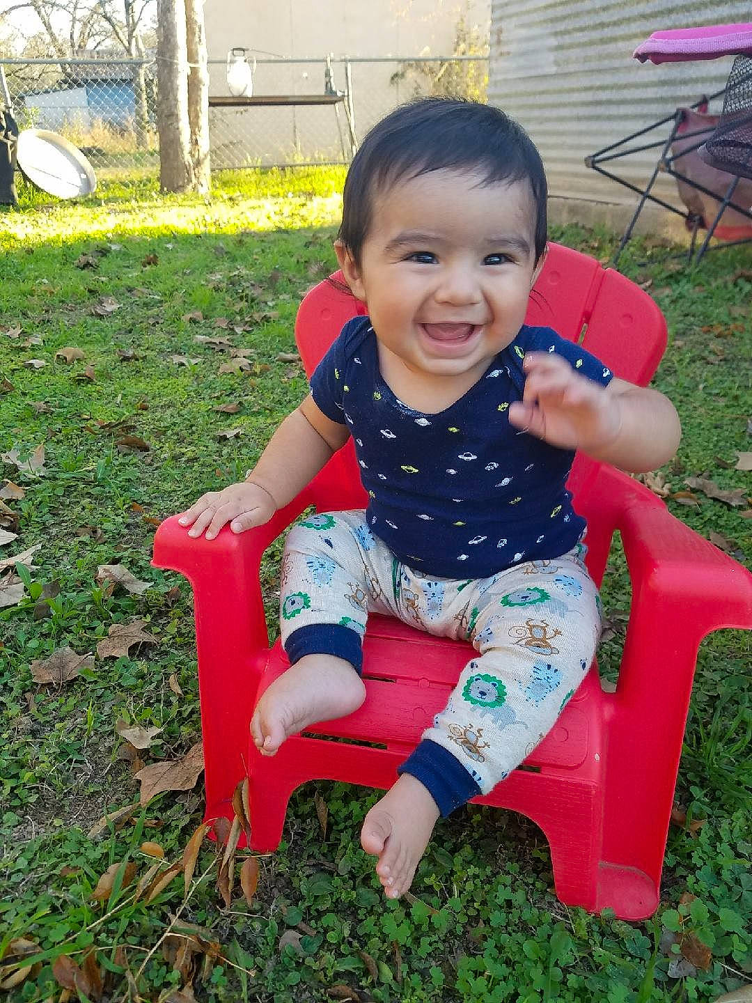 Johnathon is registered to the contest to win money with this photo: child, day, facial_expression, fun, garden, girl, grass, happiness, infant, joy, lawn, person, pink, plant, play, product, sitting, skin, smile, toddler