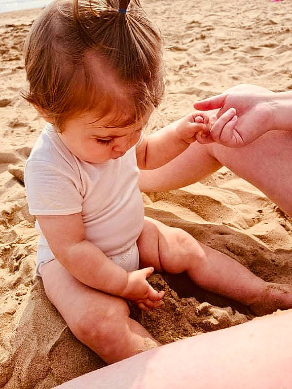 Adalynn joined the competition — help win amazing prizes! beach, child, foot, fun, gesture, hand, happy, head, leisure, mammal, nail, people_in_nature, people_on_beach, person, play, sand, sitting, skin, soil, summer