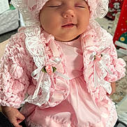 Sumayah is registered to the contest to win money with this photo: adorable, baby, bonnet, child, closeup, clothing, cozy, cute, dress, hand, indoors, infant, lace, person, pink, portrait, ribbons, sleeping, soft, tights