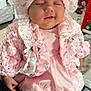 Sumayah is registered to the contest to win money with this photo: adorable, baby, bonnet, child, closeup, clothing, cozy, cute, dress, hand, indoors, infant, lace, person, pink, portrait, ribbons, sleeping, soft, tights