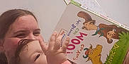 Serena joined the competition — help win amazing prizes! baby, adult, book, reading, indoor, child, woman, face, hand, smile, clothing, illustration, storybook, parent, interaction, family, person, cozy, bonding, happy