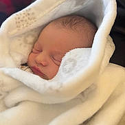 Jarrett joined the competition — help win amazing prizes! baby, blanket, sleeping, newborn, soft, face, wrapped, cozy, infant, peaceful, closeup, portrait, cute, warm, head, skin, rest, comfort, child, indoors