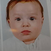 Sanja participe au concours pour gagner de l'argent avec cette photo : baby, infant, portrait, face, eyes, mouth, hair, skin, white_clothing, white_background, closeup, headshot, passport_photo, young_child, expressionless, photograph, gaze, border, reflection, studio_style