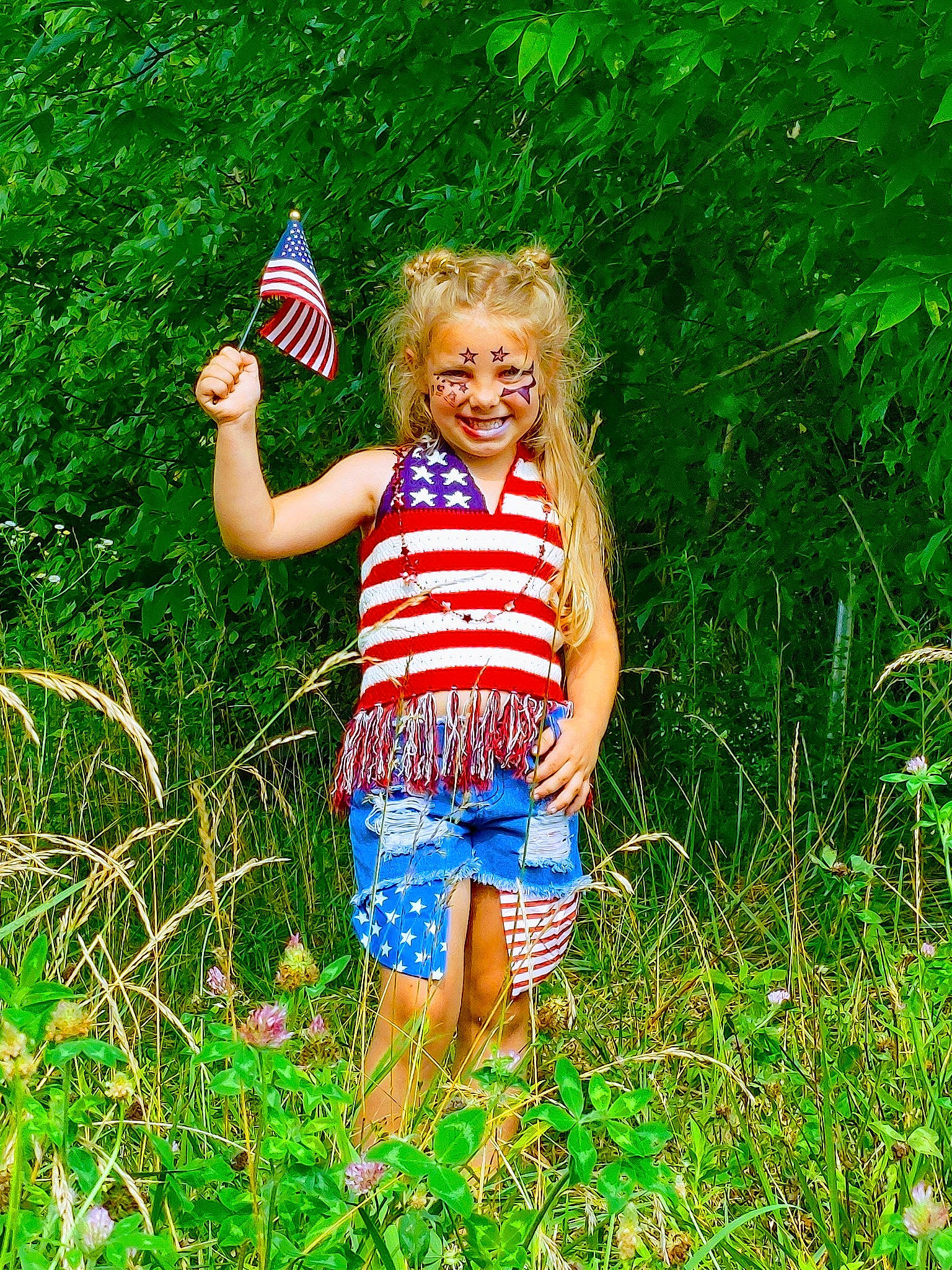 Braylee joined the competition — help win amazing prizes! child, electric_blue, fun, grass, grass_family, grassland, happy, joy, meadow, natural_environment, pattern, people_in_nature, person, plant, shorts, smile, swimwear, t_shirt, terrestrial_plant, toddler