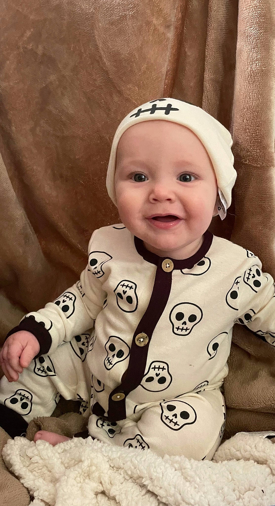 Jeremiah joined the competition — help win amazing prizes! baby, baby_toddler_clothing, cap, cheek, child, collar, comfort, fashion_accessory, fun, happy, head, lip, outerwear, pattern, person, sitting, skin, sleeve, smile, toddler