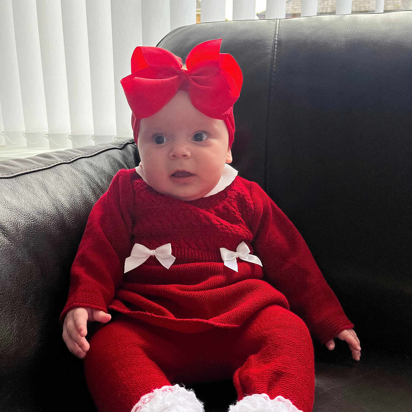 Nevaeh is registered to the contest to win money with this photo: architecture, baby, building, cap, clothing, costume, couch, cushion, face, furniture, hat, head, homedecor, indoors, livingroom, person, photography, portrait, room, sitting