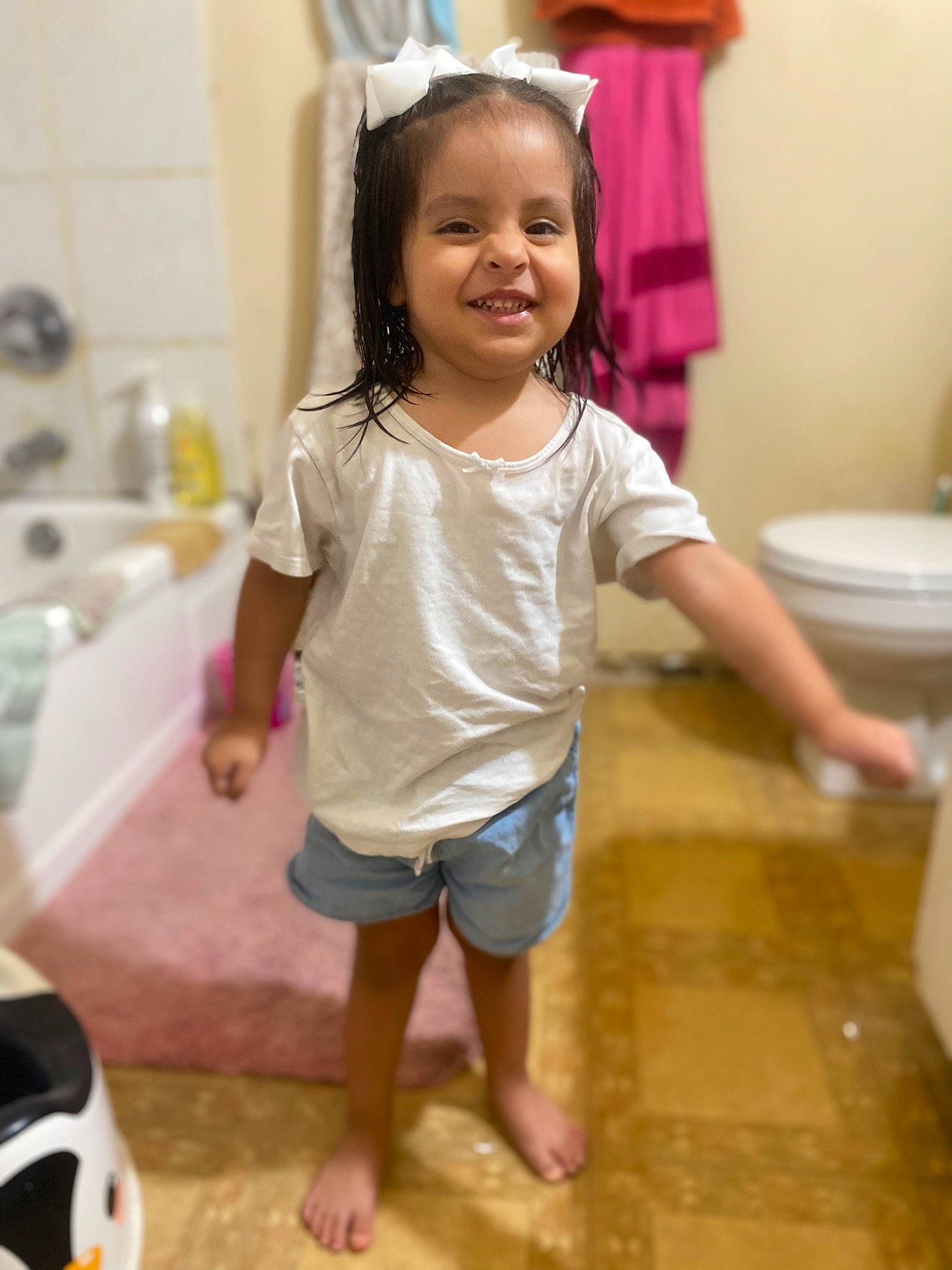 Alize joined the competition — help win amazing prizes! baby_toddler_clothing, cheek, child, floor, flooring, foot, fun, happy, human_body, joy, person, pink, plumbing_fixture, purple, shorts, skin, sleeve, smile, standing, t_shirt