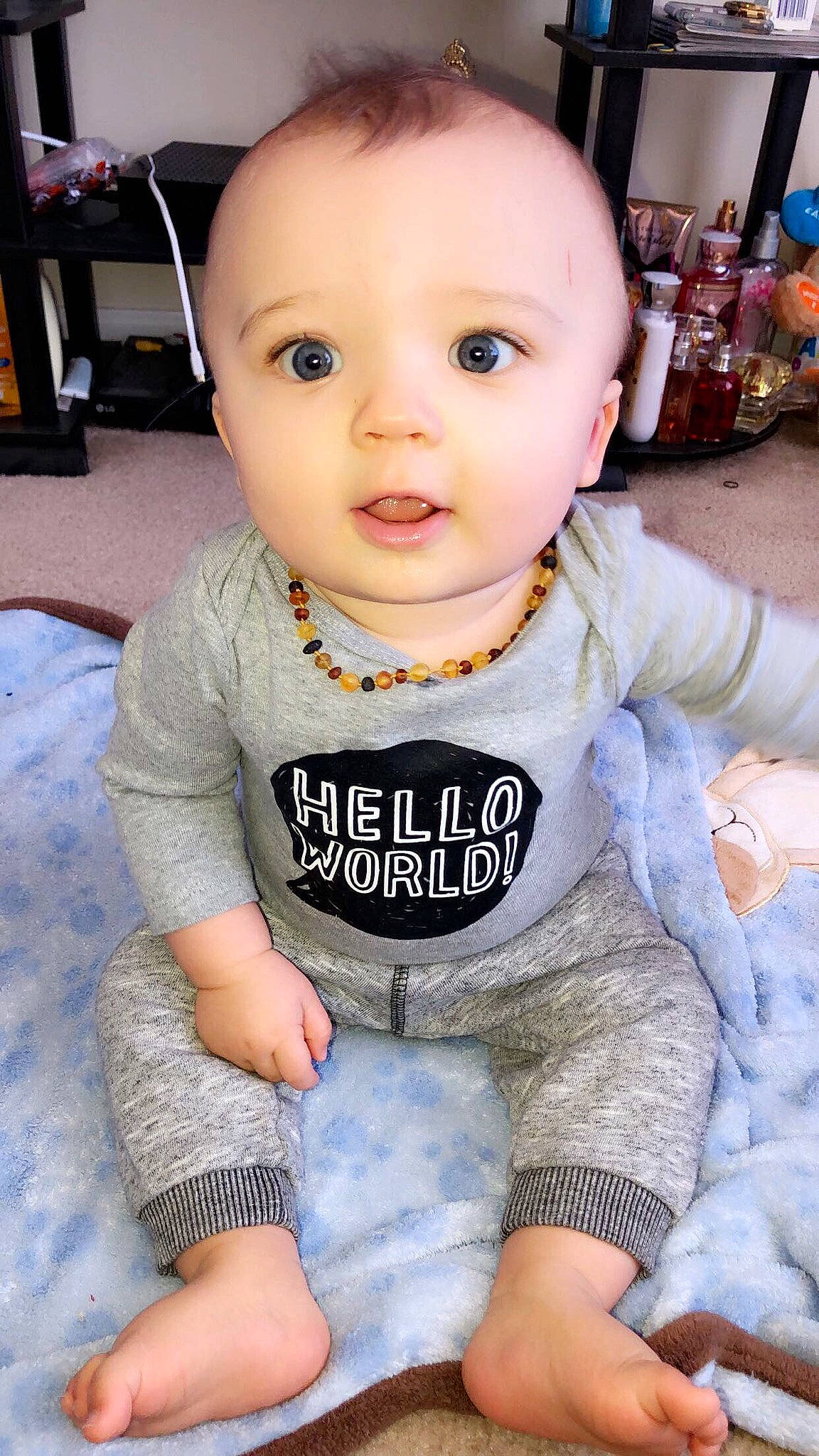 Zayne joined the competition — help win amazing prizes! baby, baby_products, baby_toddler_clothing, beauty, cheek, child, face, head, lip, person, sitting, skin, sleeve, smile, t_shirt, toddler