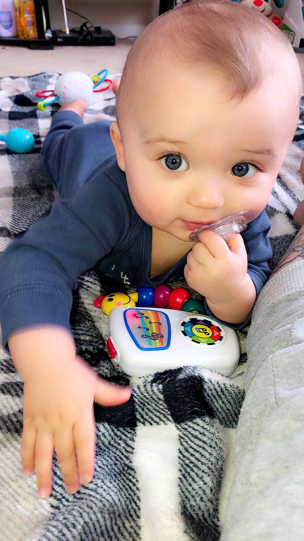 Zayne is registered to the contest to win money with this photo: baby, cheek, child, finger, nail, person, play, skin, toddler