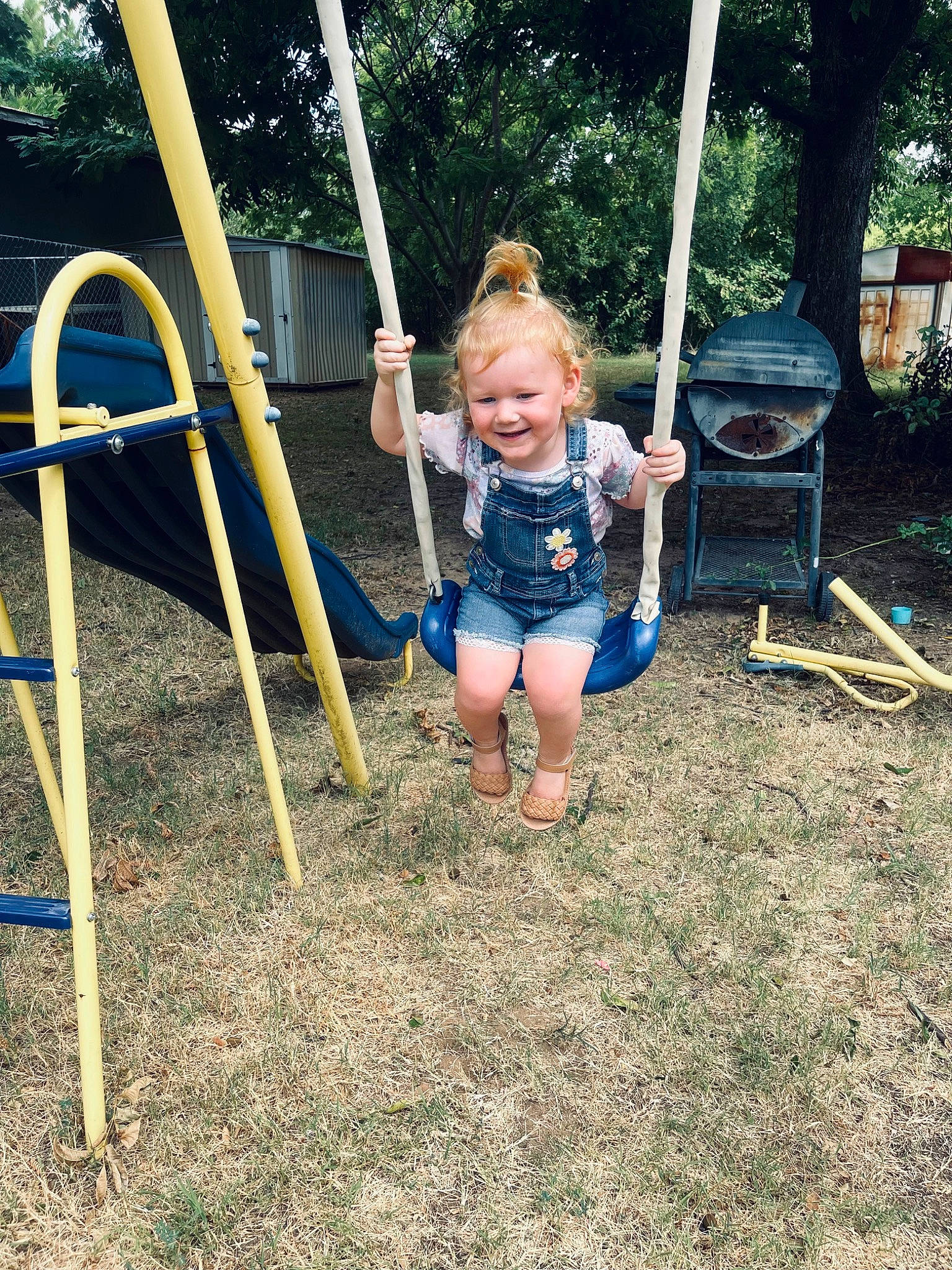 Brinley joined the competition — help win amazing prizes! balance, city, electric_blue, fun, grass, joy, leisure, outdoor_play_equipment, outdoor_recreation, people_in_nature, person, plant, play, playground, recreation, shorts, smile, soil, swing, t_shirt