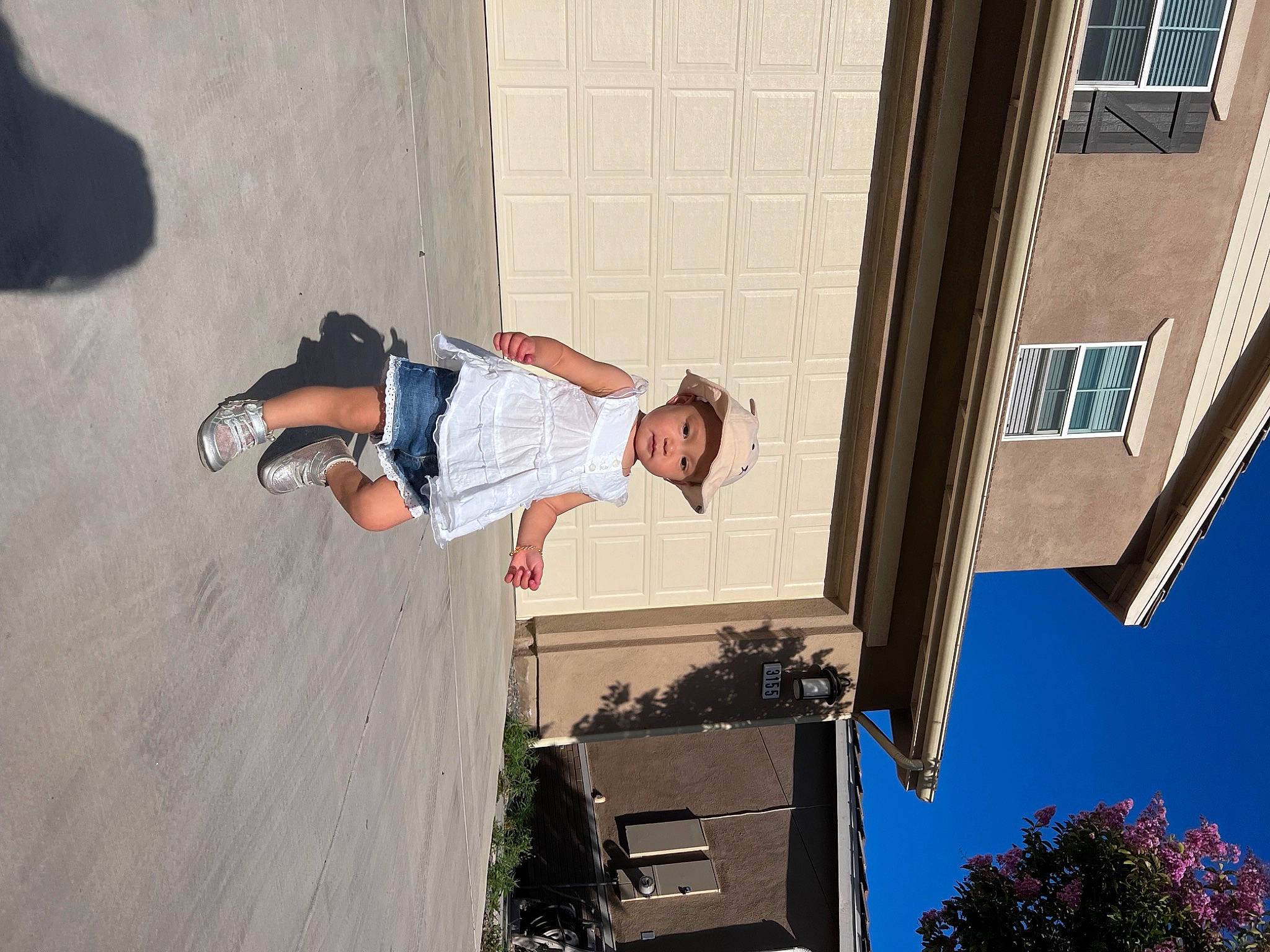 Joanne joined the competition — help win amazing prizes! adventure, building, concrete, facade, fun, headwear, human_leg, leisure, person, recreation, rolling, sky, tree, walking_shoe, wall, window