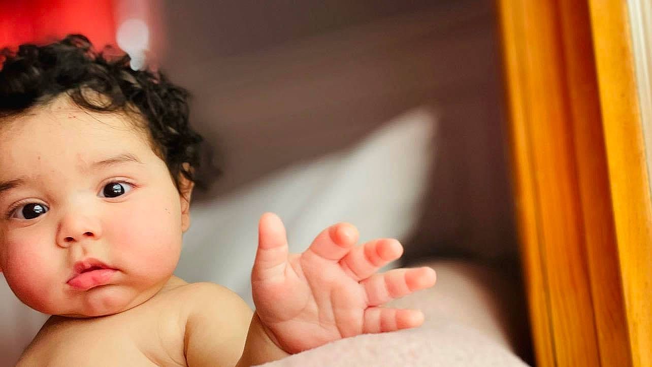 Jadiel joined the competition — help win amazing prizes! baby, cheek, child, close_up, comfort, eyelash, face, finger, flash_photography, gesture, happy, human_leg, lip, nail, neck, nose, person, skin, thumb, toddler